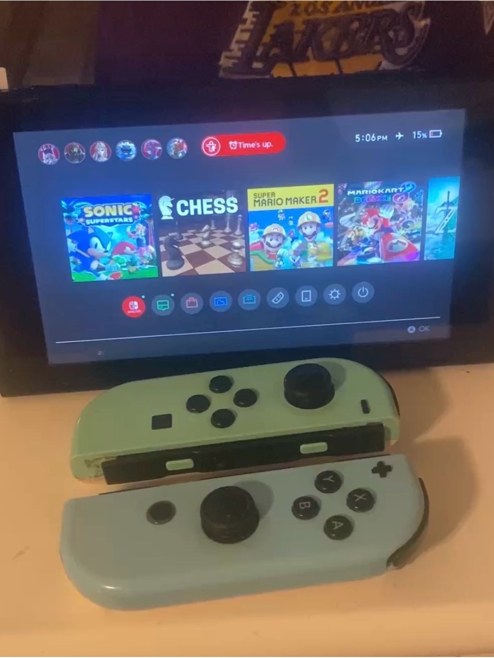 Nintendo Switch with Mint Green and Light Blue Joy-Con Controllers